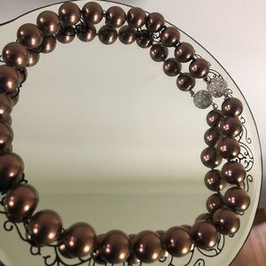 Patti Tobin ...... pearl necklace